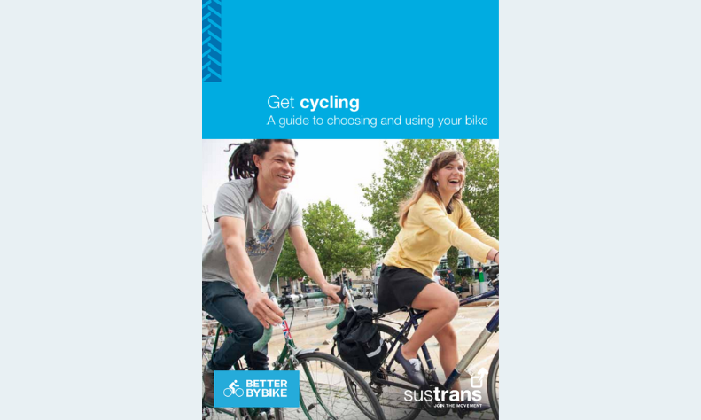 Image of man and women cycling looking happy